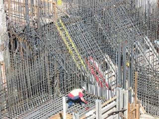 Rebar being set in place for the foundation of a sewage treatment plant pump station